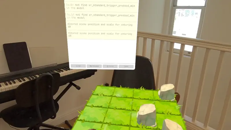 Recording of a person interacting with a table top project. Actions like planting trees generate events in the console log, visible in the back.